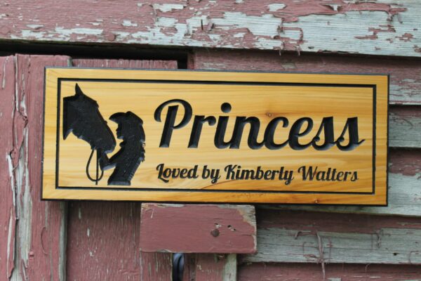 carved horse stall sign